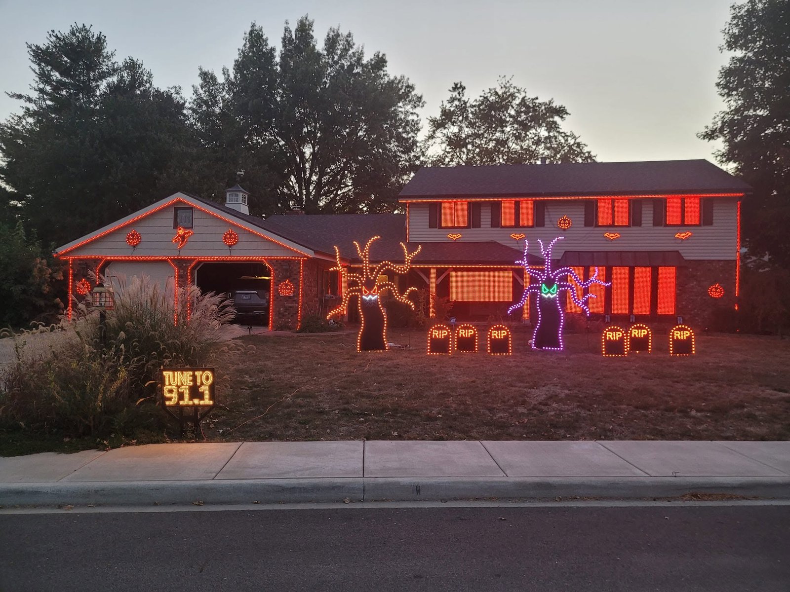That House on Nebraska decorated with glowing Halloween lights